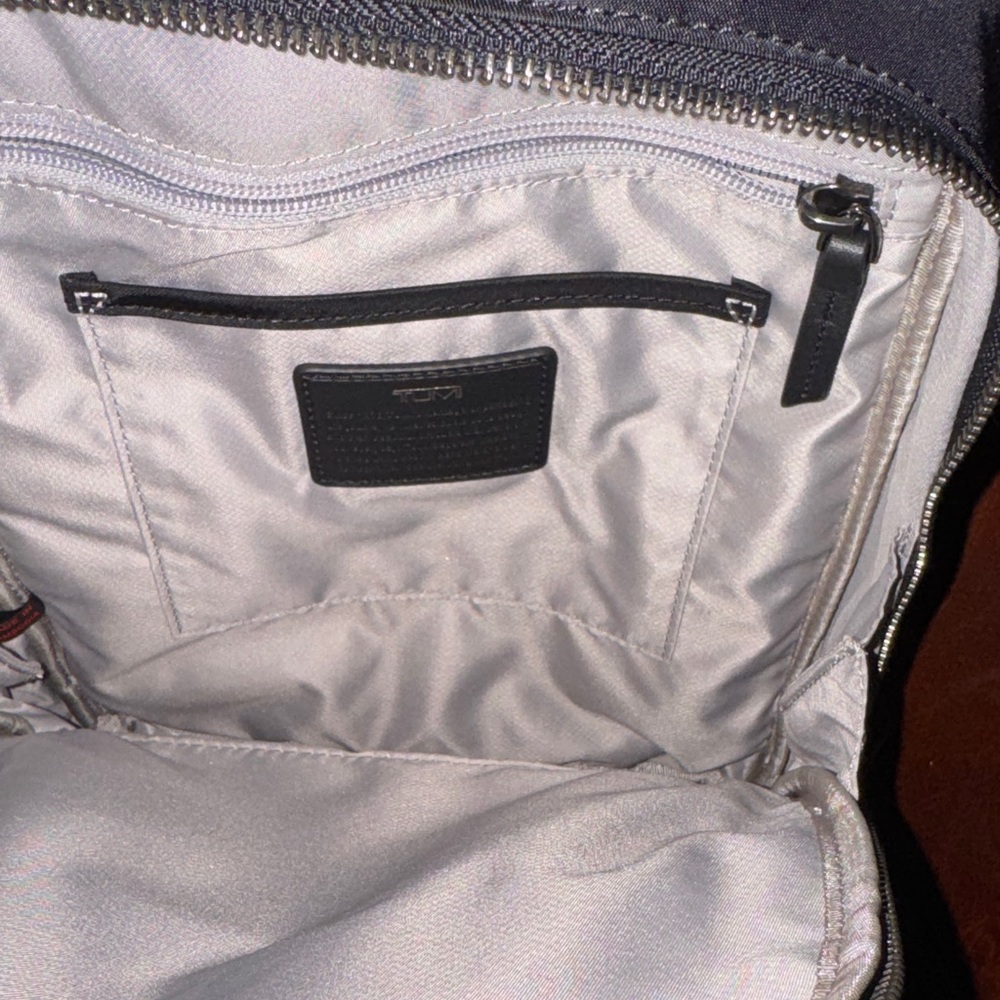 NWOT RARE TUMI Monett Black Camo mini sling backpack - Picture 6 of 9